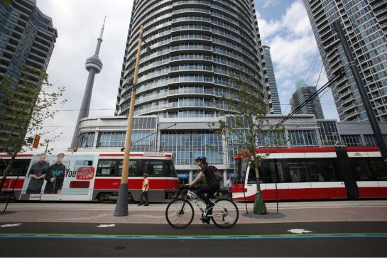 Queens Quay Re-opens with Beautiful Bike Lanes, Sidewalks and Trees